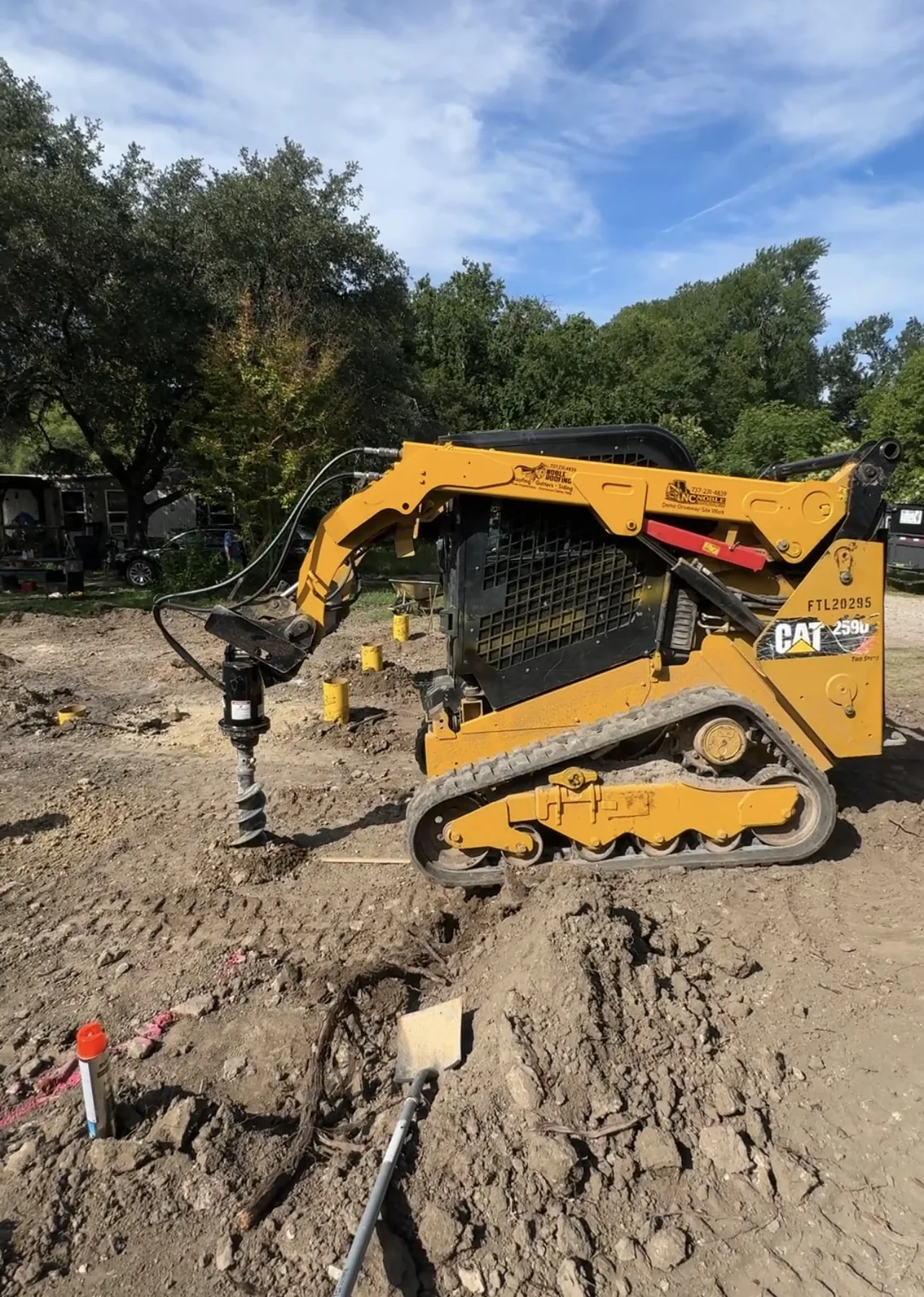 CAT 259D with auger