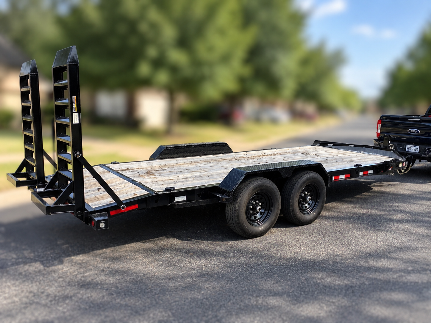 Equipment trailer fold-up ramps