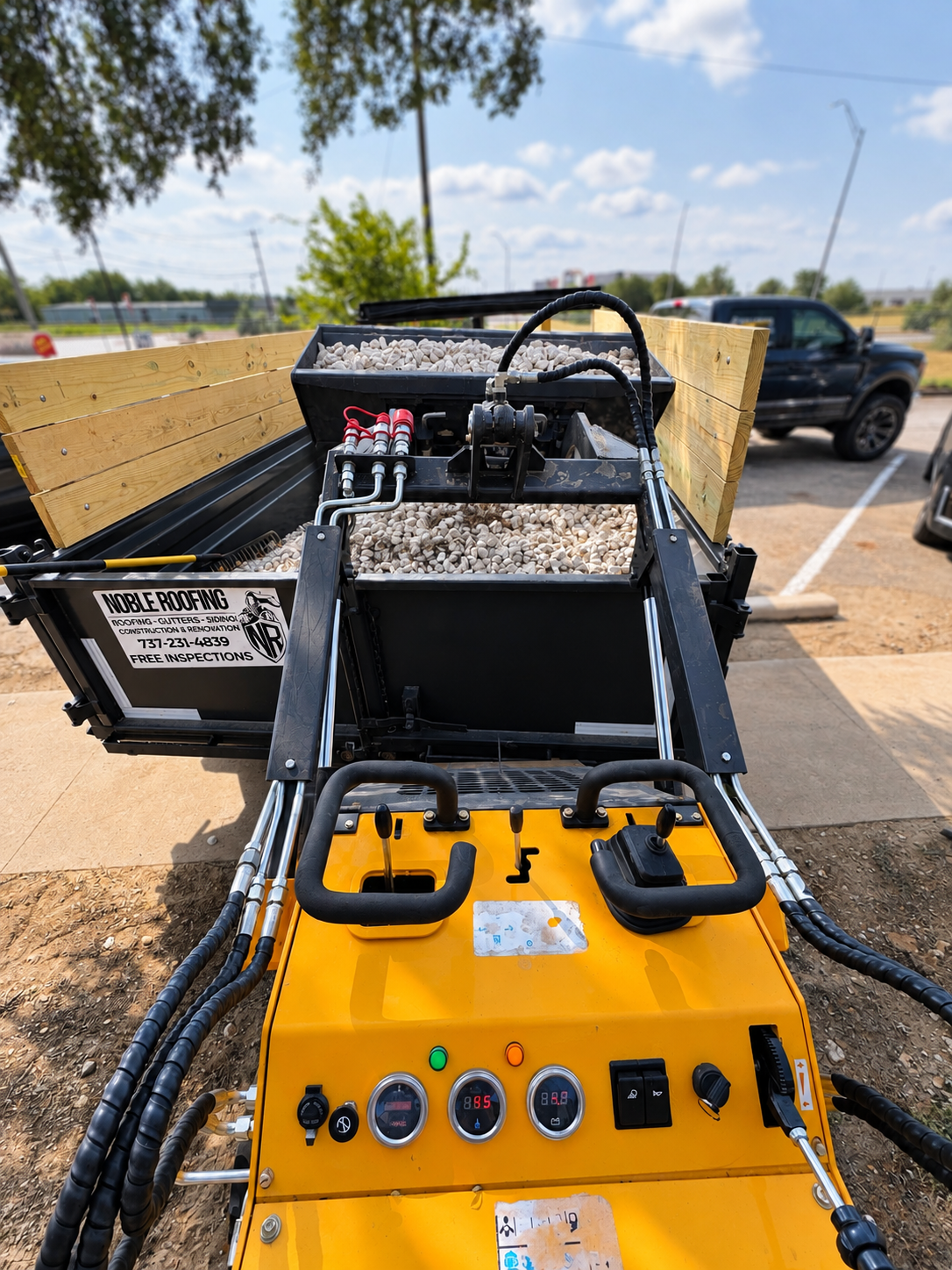 Operator view of ZJ-380 mini skid steer controls